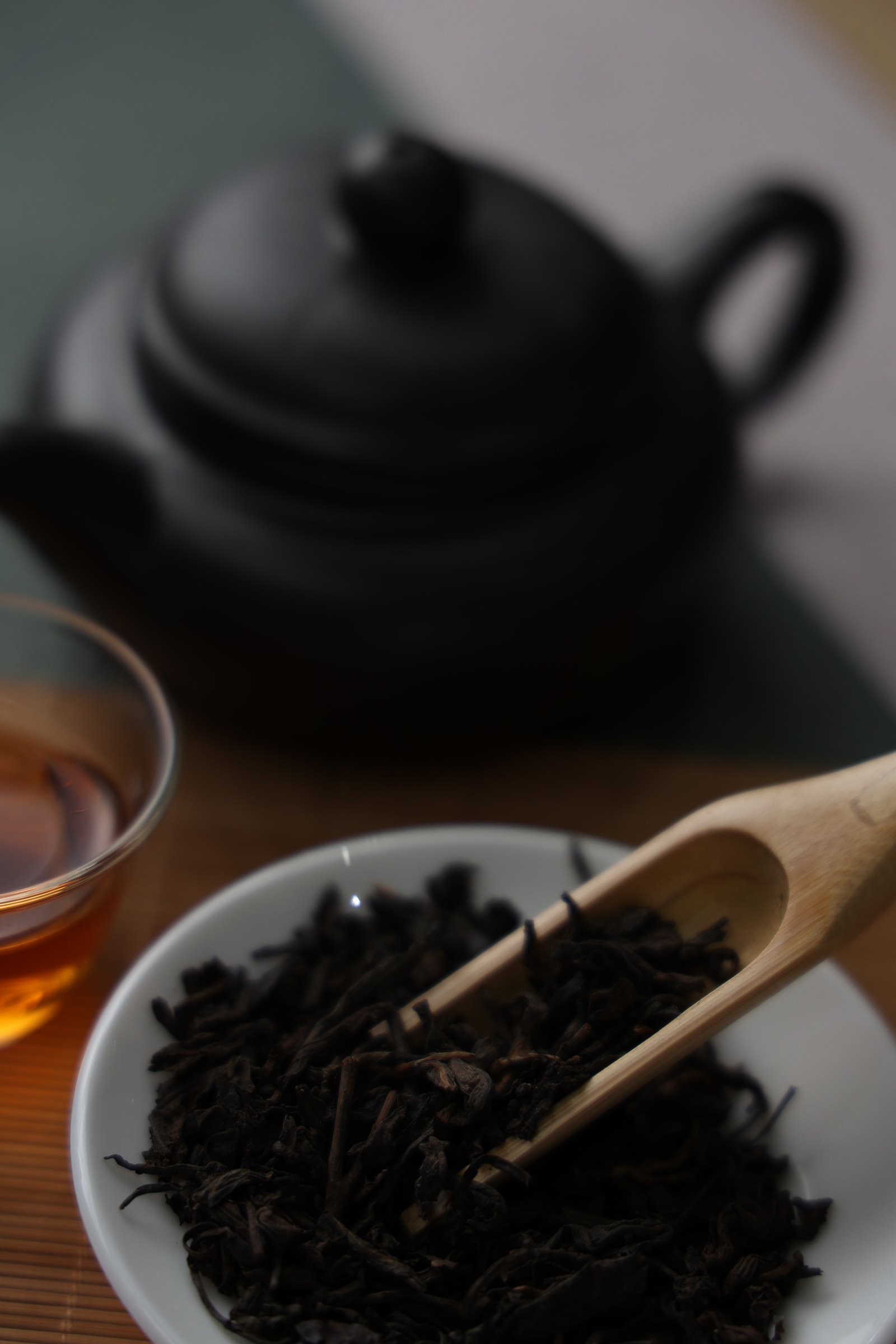 Loose tea being poured into a teapot